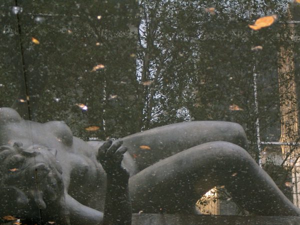 Reclining, Through Wet Glass
